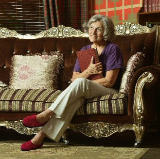 Lady relaxing wearing slippers